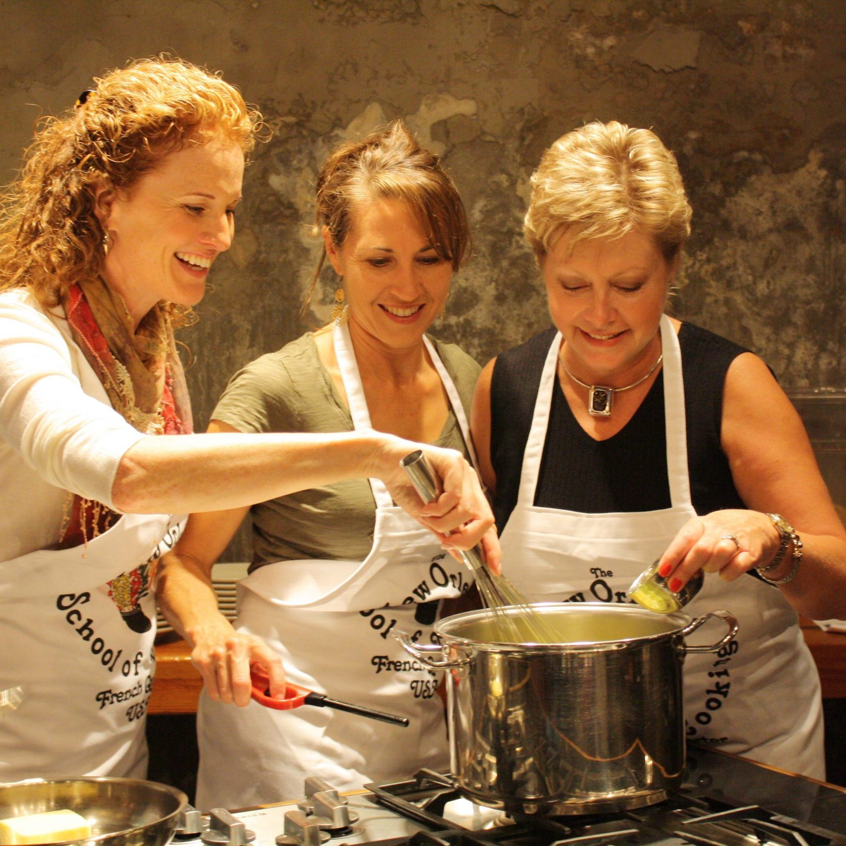 three-women-cooking-tradition three women cooking holiday tradition