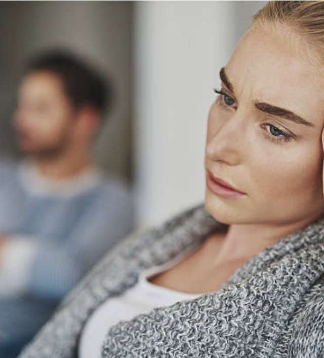 Woman on couch sad and heartbroken due to her husbands affair in St George Utah